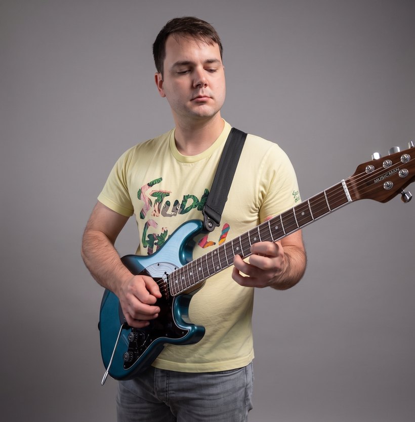 Steven Converse playing guitar